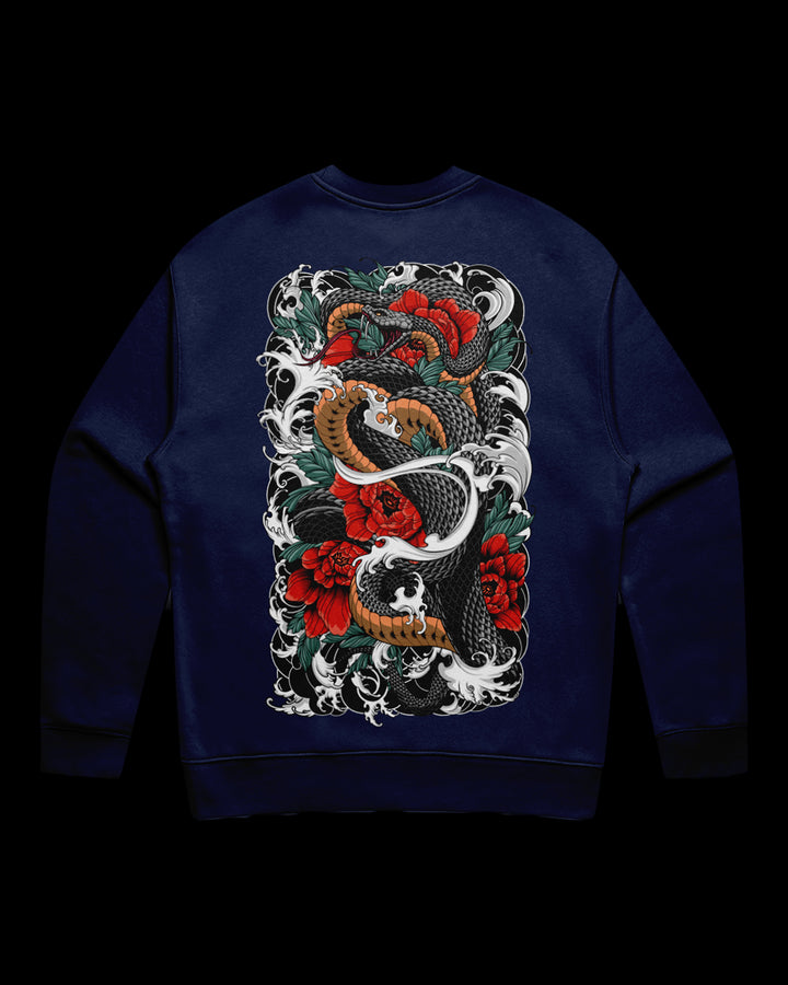 Cobalt sweatshirt with a snake and floral design on the back.