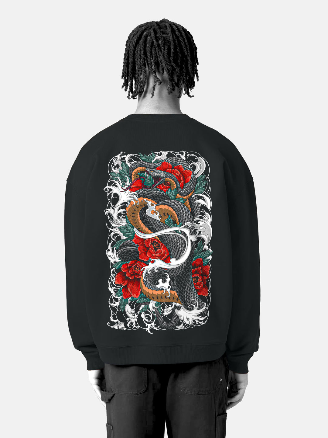 Back of black oversized sweatshirt showing large Irezumi-style serpents and peony graphic – Serpents Bloom tattoo artwork