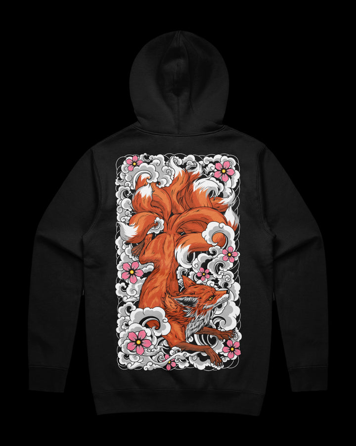Black hoodie with a fox and floral design on the back against a black background