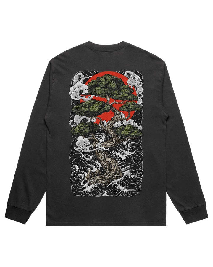 A black long-sleeve t-shirt shown from the back, featuring a large graphic print of a bonsai tree with green foliage, white waves, and a red sun.