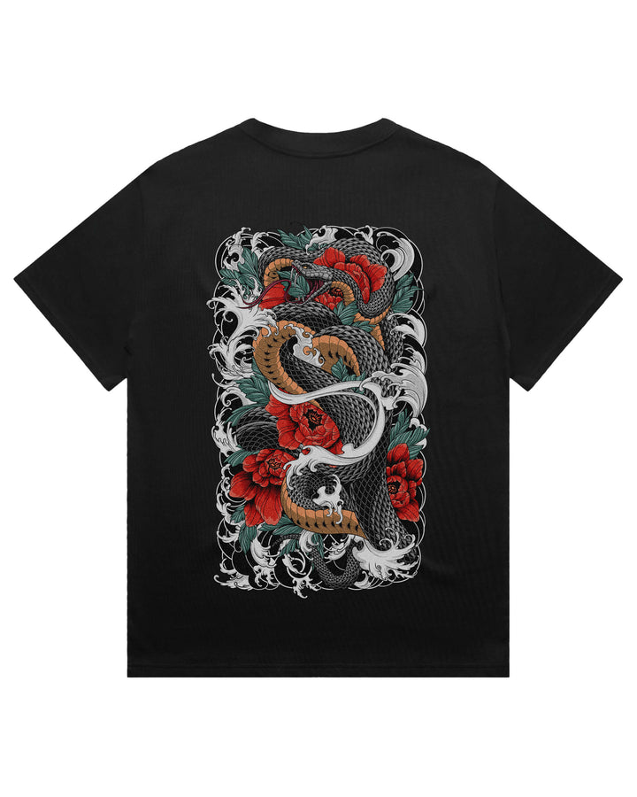 Oversized black t-shirt featuring large snake coiling around foliage print