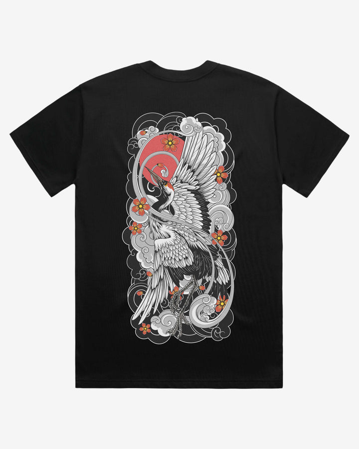 Black oversized graphic t-shirt with a white crane and floral design on a white background