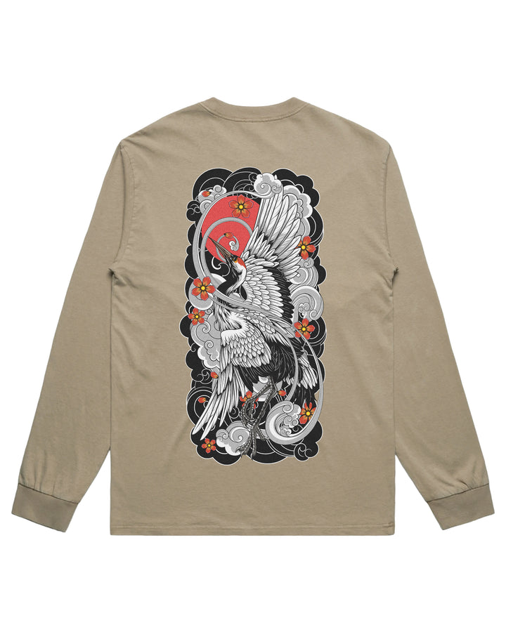 Faded khaki long-sleeve t-shirt with a large graphic print on the back featuring a detailed black and white crane design with a red sun and orange flowers.