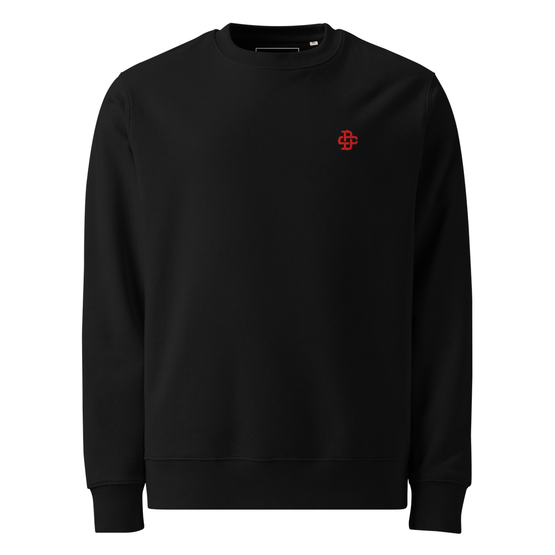 Product mockup of the front of a black sweatshirt with the dc monogram embroidered in red on the left chest