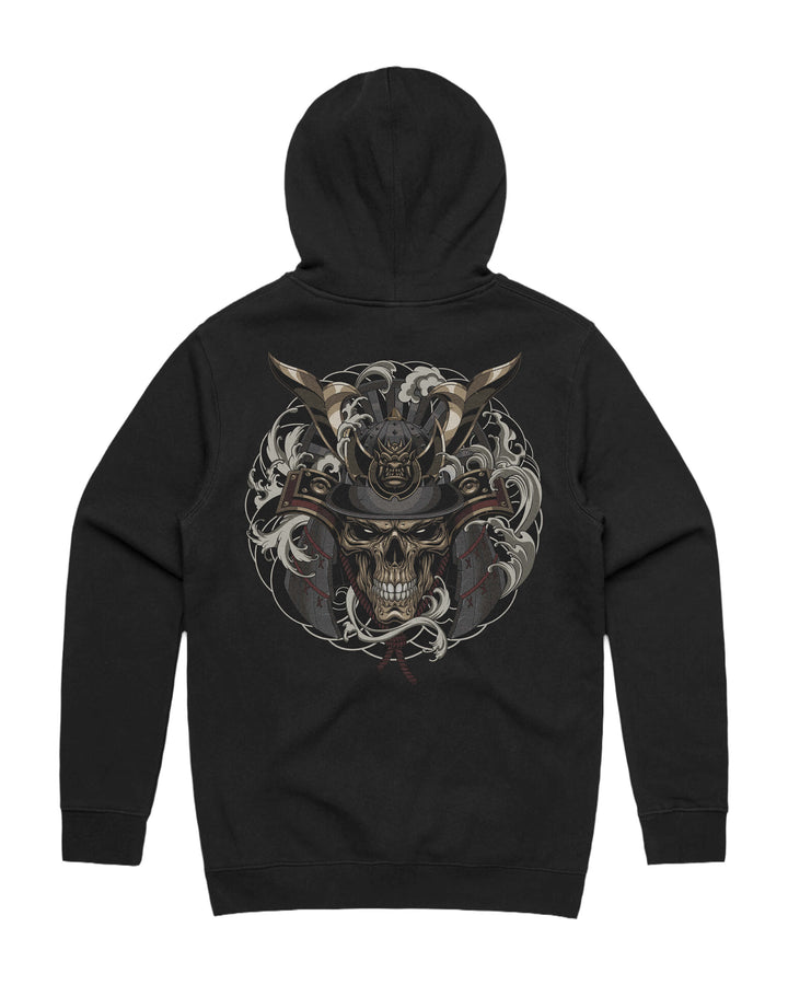A black pullover hoodie shown from the back, featuring a large graphic print of a skull wearing a samurai helmet and surrounded by swirling smoke in gray, white, and red tones.
