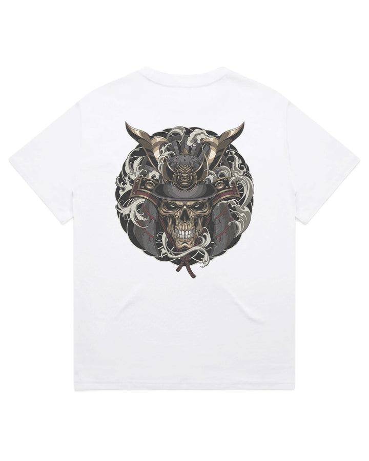 A white short-sleeve crewneck t-shirt featuring a large graphic print on the back. The graphic depicts a detailed illustration of a skull wearing a samurai helmet, surrounded by a circular irezumi frame details.