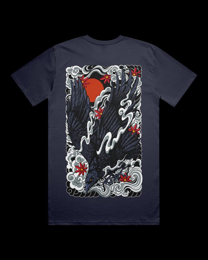 Irezumi inspired graphic print of a decending crow with clouds against a red sun large on the back of a midnight blue t shirt