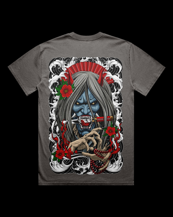 Gray t-shirt with a graphic design of a blue-skinned character with gray hair, red flowers, and white accents on a black background.