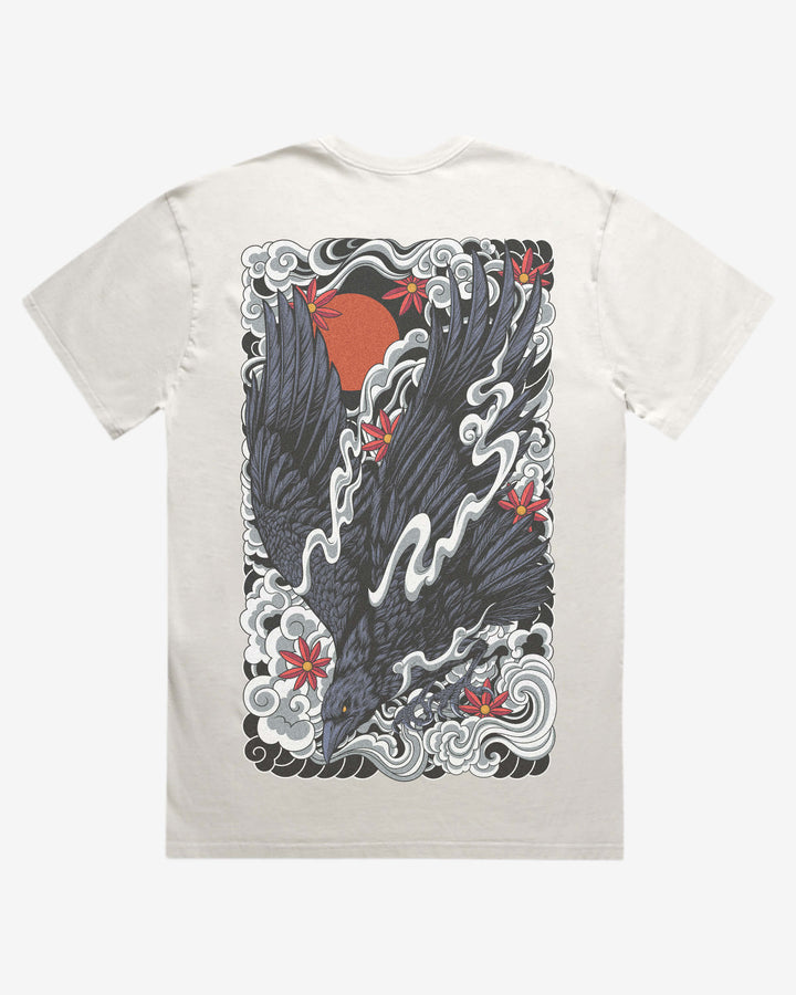faded bone graphic t-shirt with a raven and irezumi clouds design on the back against a white background