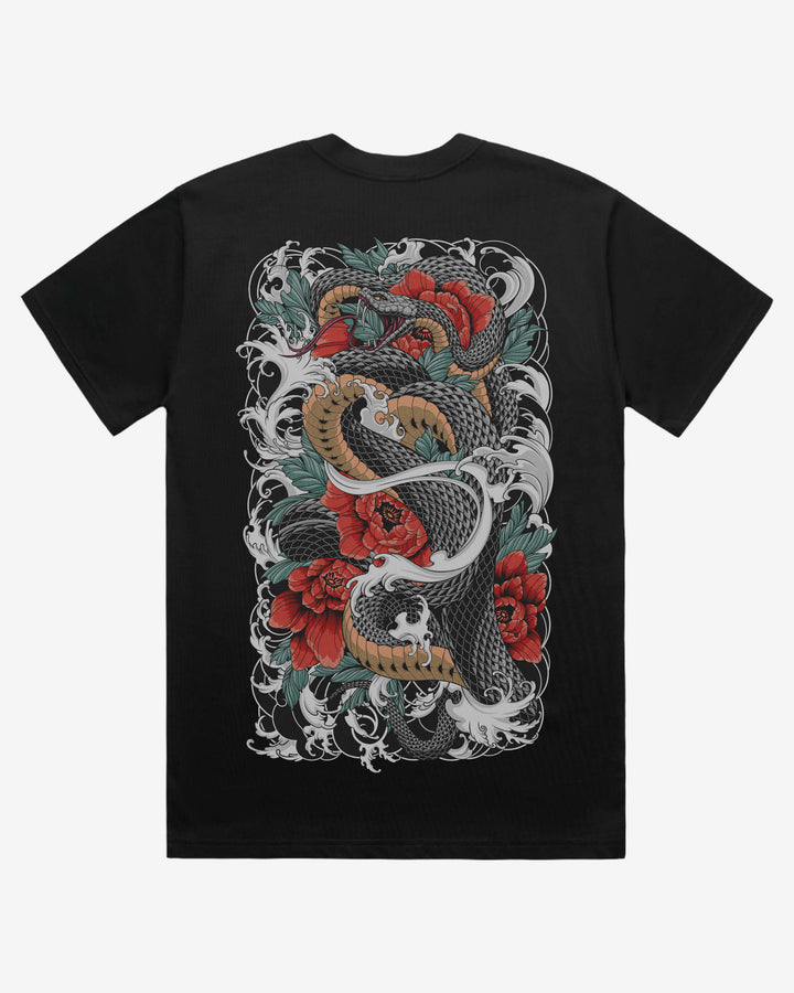 Black t-shirt with a snake and floral design on a white background