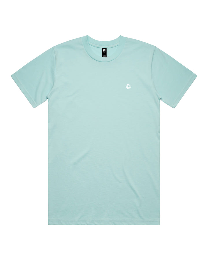 A light blue crewneck t-shirt with a small white geometric logo on the left chest.